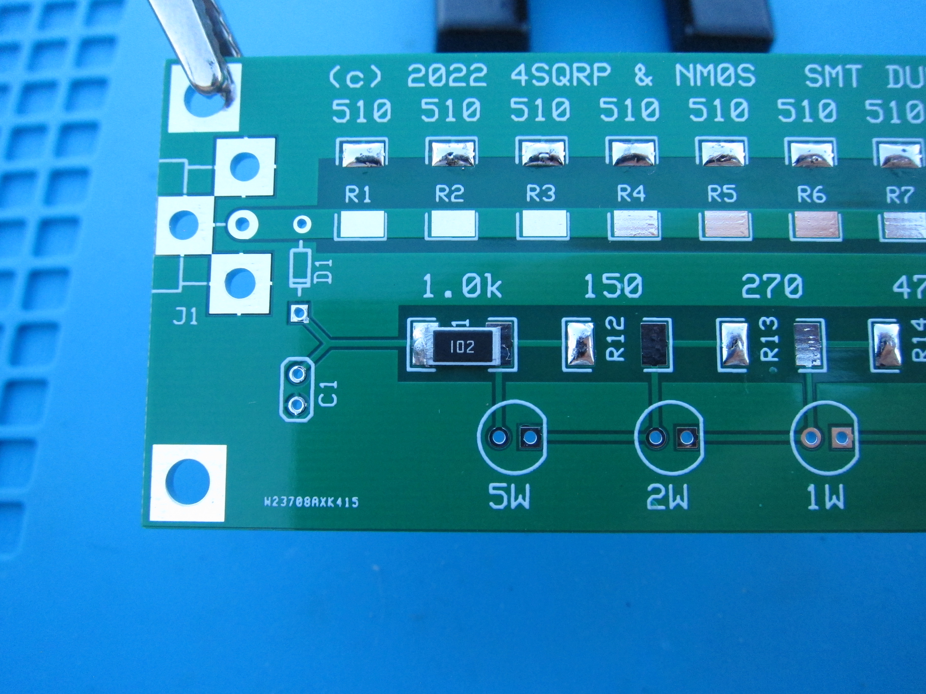 One component placed with left side soldered down
